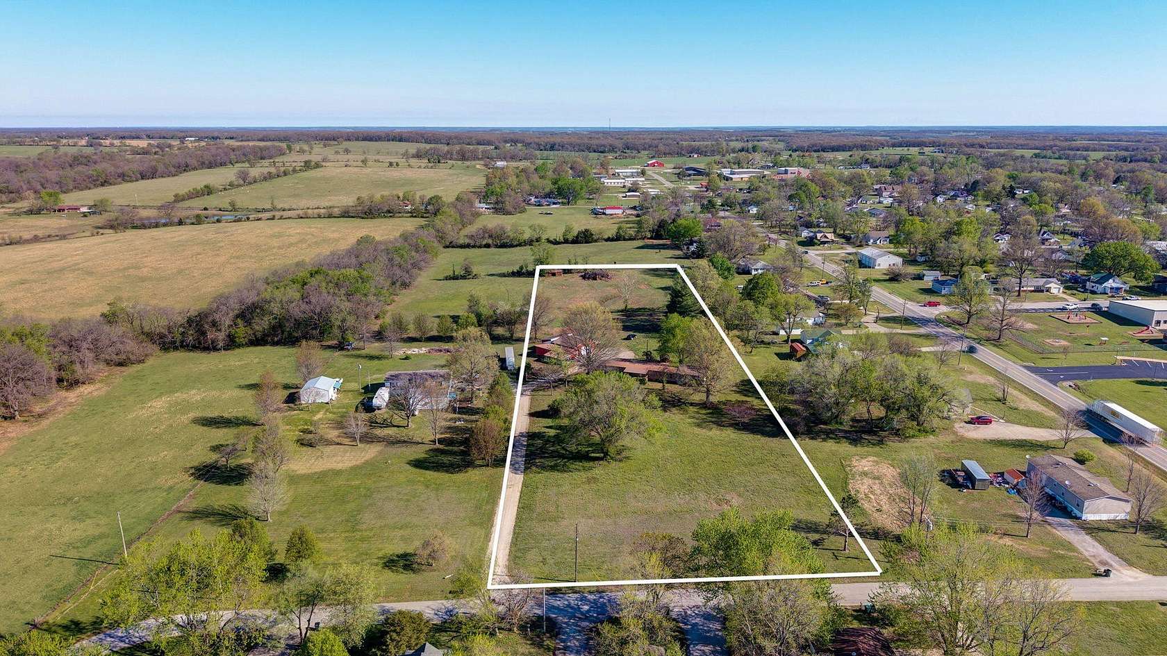 3.82 Acres of Land with Home for Sale in Miller, Missouri