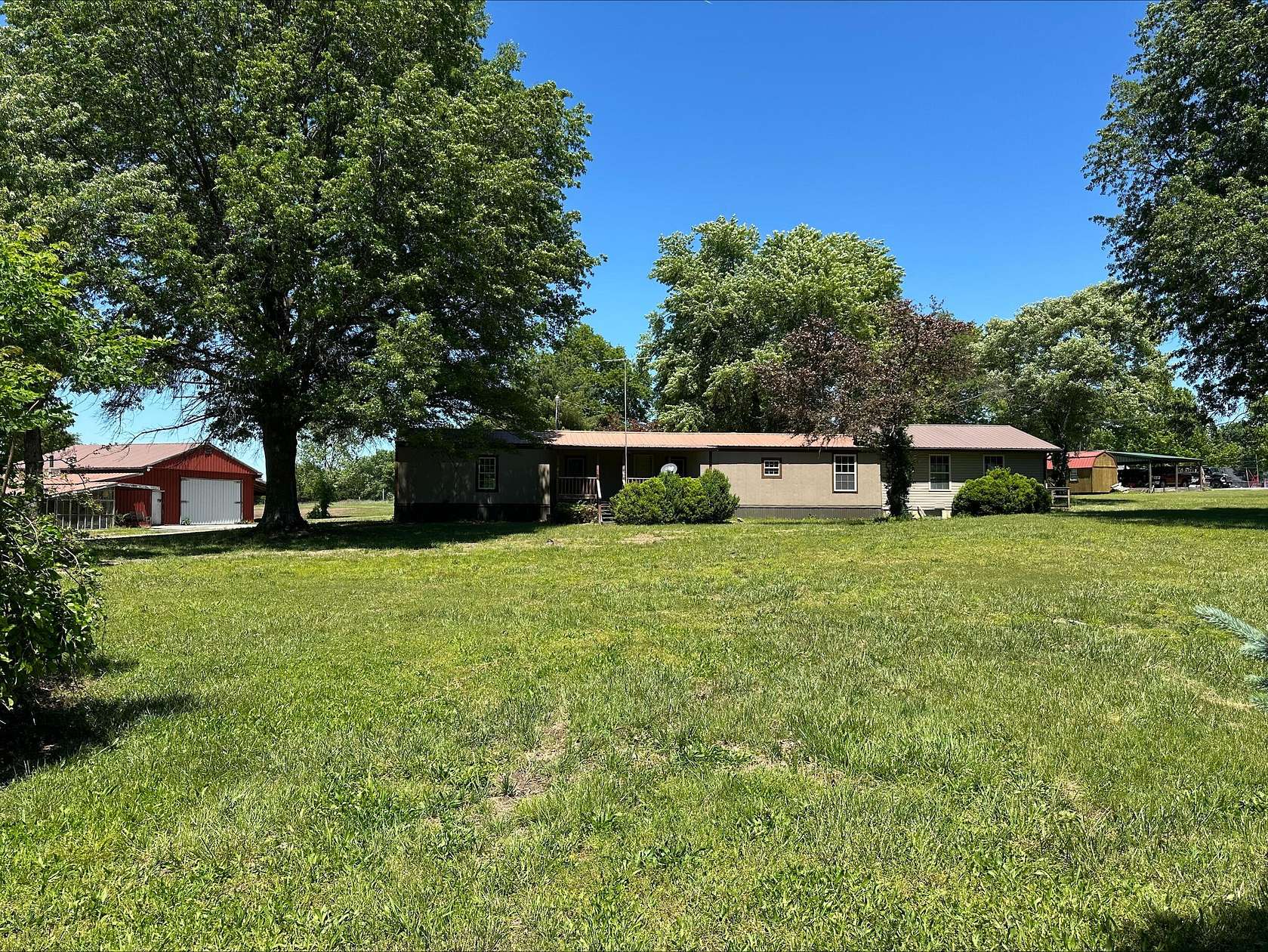 3.82 Acres of Land with Home for Sale in Miller, Missouri