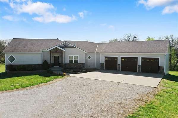 3.8 Acres of Land with Home for Sale in Peculiar, Missouri