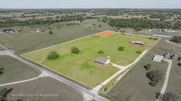 10 Acres of Land with Home for Sale in Glen Rose, Texas