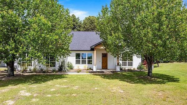 35 Acres of Agricultural Land with Home for Sale in Bullard, Texas