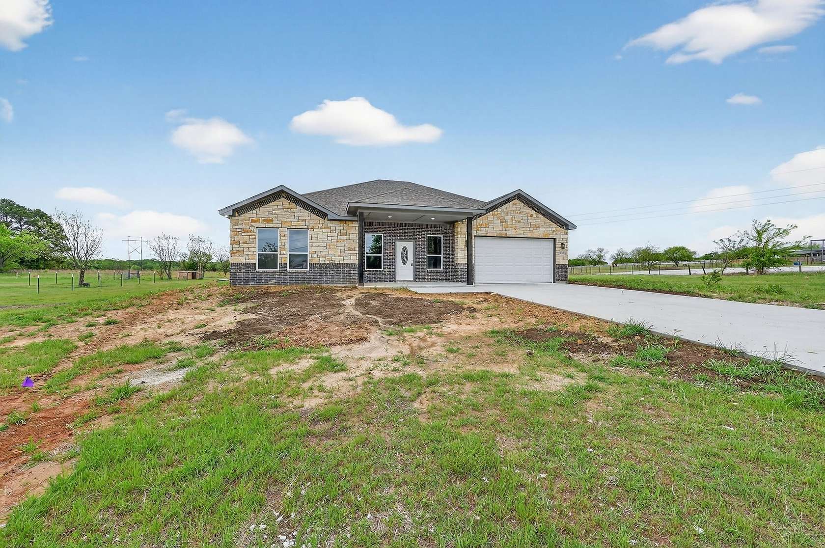 3 Acres of Land with Home for Sale in Grandview, Texas