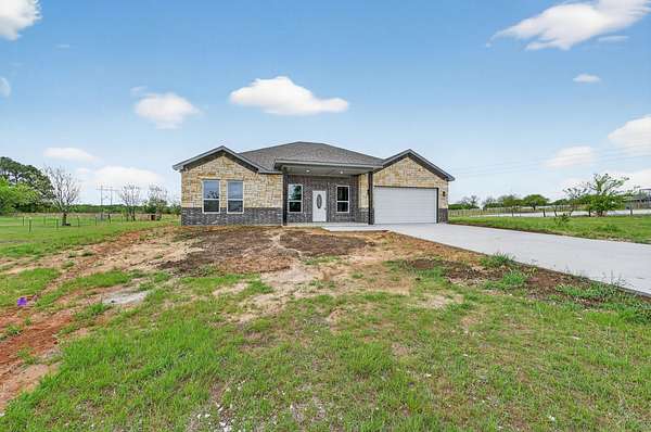 3 Acres of Land with Home for Sale in Grandview, Texas