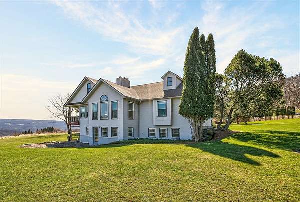 14 Acres of Land with Home for Sale in Naples, New York