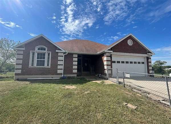 5.69 Acres of Land with Home for Sale in Centerview, Missouri