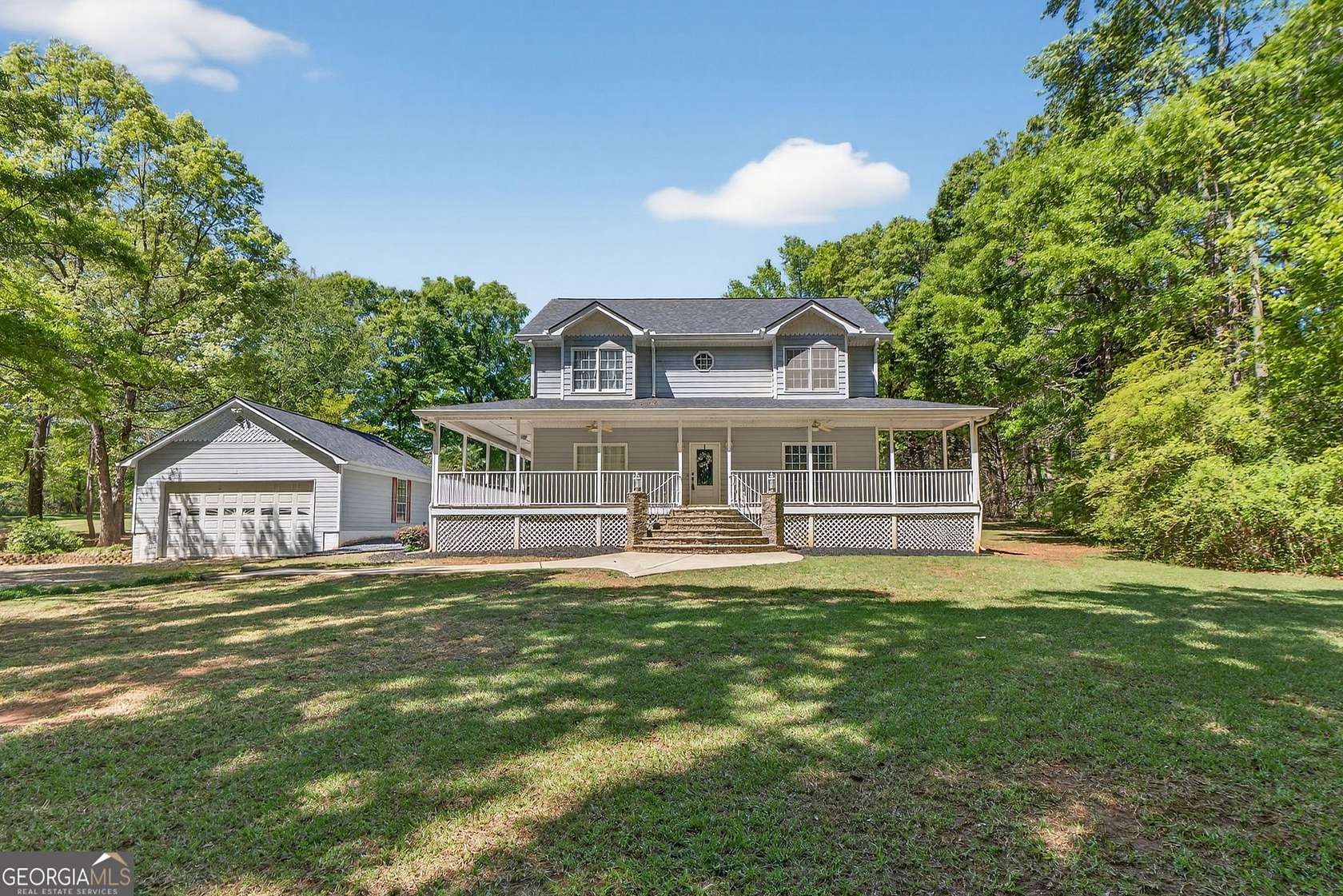 6.85 Acres of Land with Home for Sale in Locust Grove, Georgia