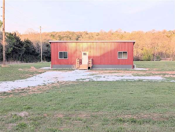 5.84 Acres of Land with Home for Sale in Lead Hill, Arkansas