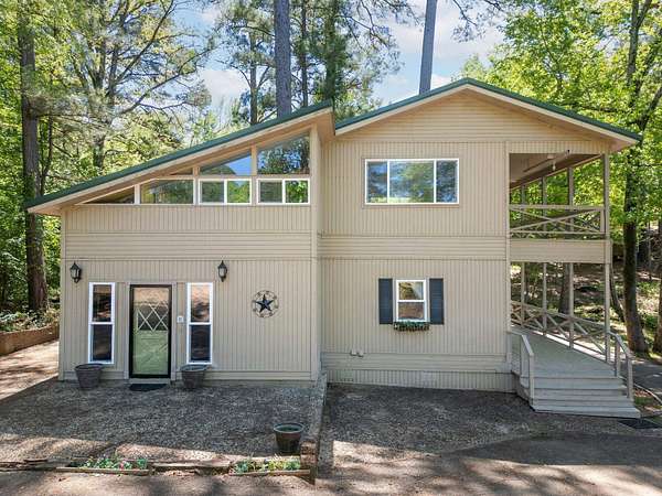 2.5 Acres of Land with Home for Sale in Lone Star, Texas