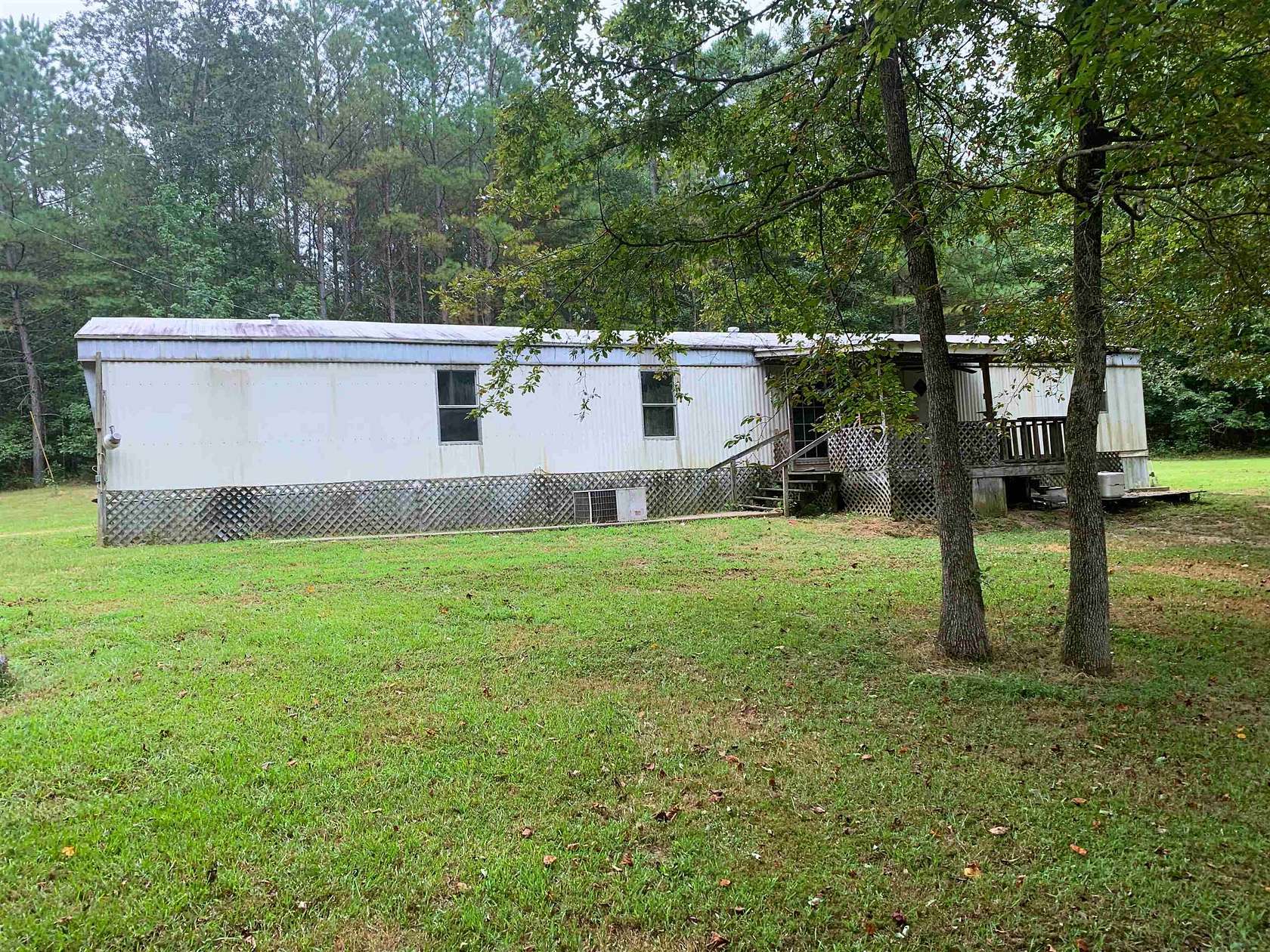 9.9 Acres of Land with Home for Sale in Florence, Alabama