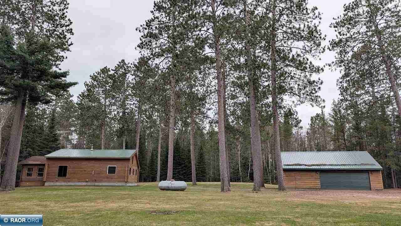 13.8 Acres of Recreational Land with Home for Sale in Angora, Minnesota