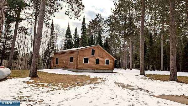 13.8 Acres of Recreational Land with Home for Sale in Angora, Minnesota