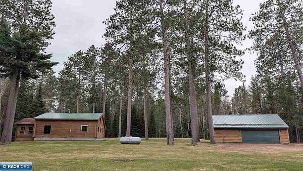 13.8 Acres of Recreational Land with Home for Sale in Angora, Minnesota