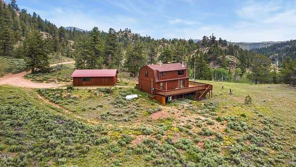 7.64 Acres of Land with Home for Sale in Red Feather Lakes, Colorado