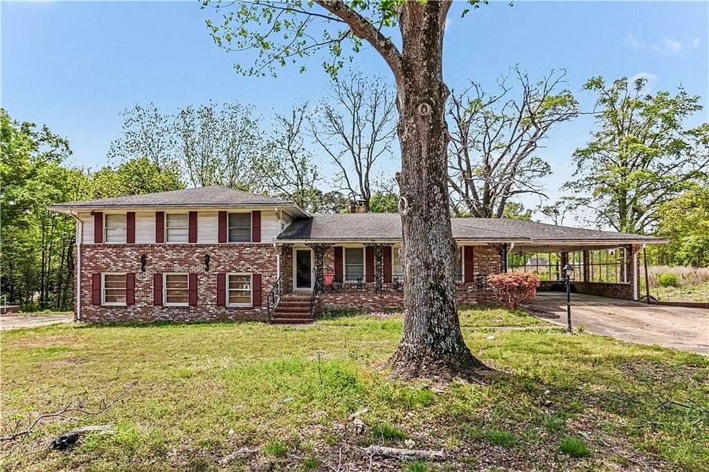 8 Acres of Land with Home for Sale in Ellenwood, Georgia