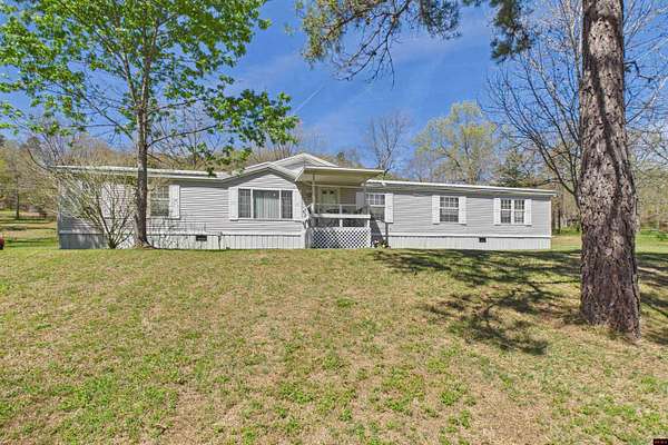 16 Acres of Land with Home for Sale in Pineville, Arkansas