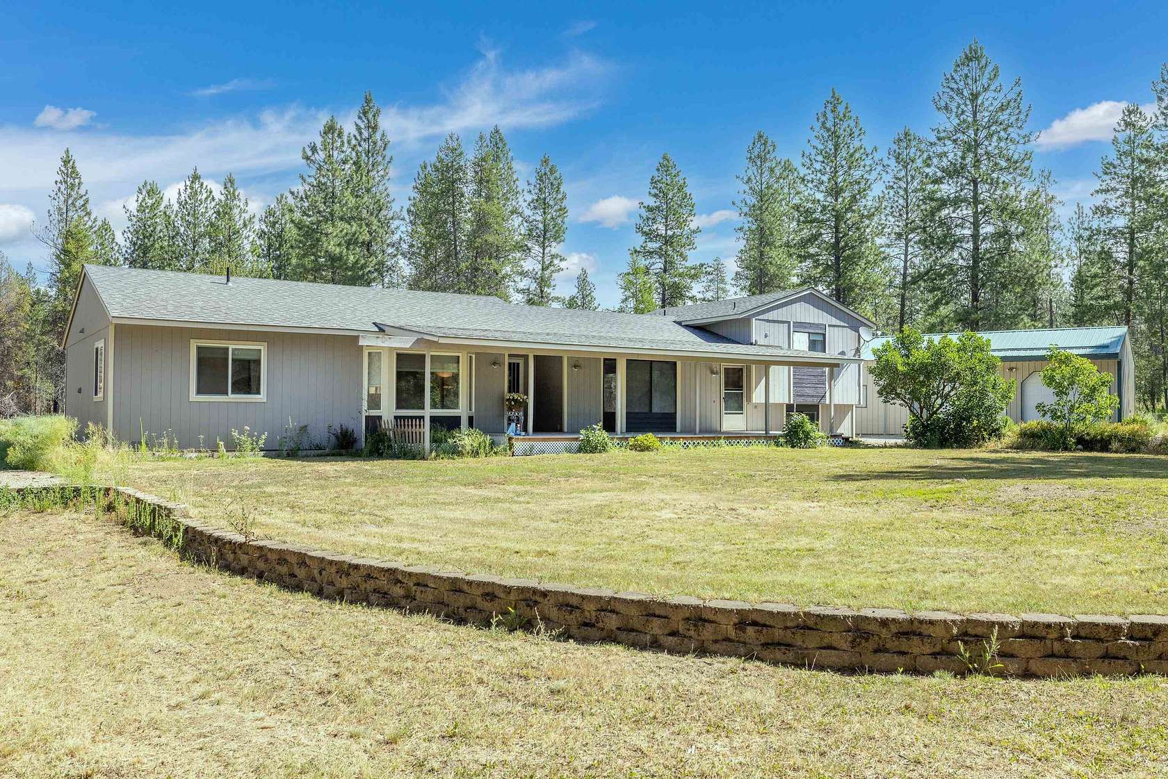 30 Acres of Recreational Land with Home for Sale in Elk, Washington