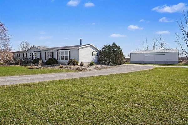 1.74 Acres of Land with Home for Sale in Birch Run, Michigan