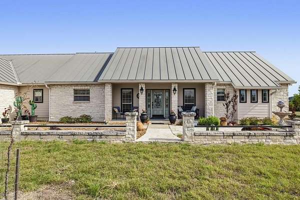 44.2 Acres of Agricultural Land with Home for Sale in Center Point, Texas