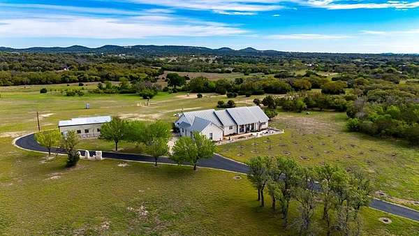 44.2 Acres of Agricultural Land with Home for Sale in Center Point, Texas