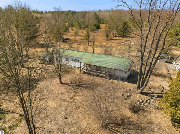 2.6 Acres of Land with Home for Sale in Thompsonville, Michigan