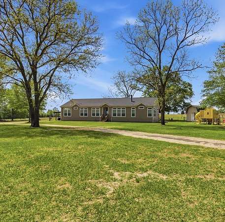 7.28 Acres of Land with Home for Sale in Mount Enterprise, Texas