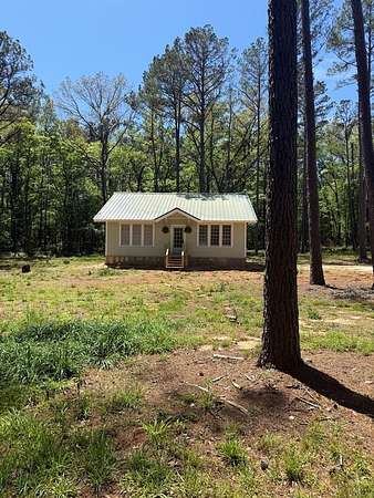 6.16 Acres of Land with Home for Sale in Cushing, Texas