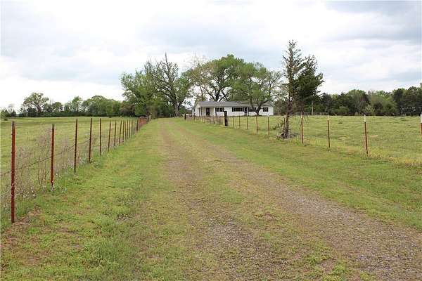 31.5 Acres of Land with Home for Sale in Hartman, Arkansas