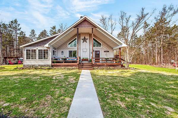 69.6 Acres of Recreational Land with Home for Sale in Rothbury, Michigan