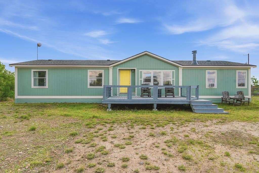 4.63 Acres of Land with Home for Sale in Hondo, Texas