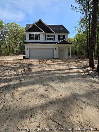3.35 Acres of Land with Home for Sale in Spring Lake, North Carolina