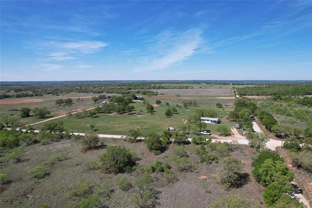 7.46 Acres of Land with Home for Sale in Carbon, Texas