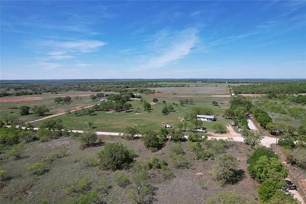 7.46 Acres of Land with Home for Sale in Carbon, Texas