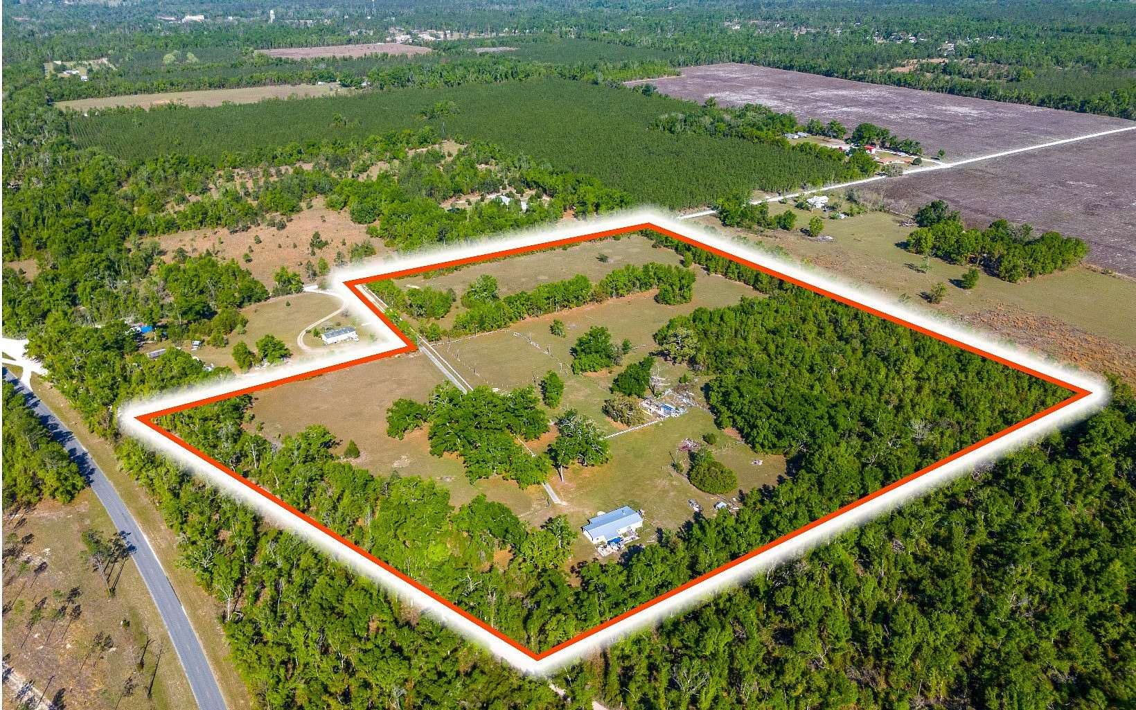 29 Acres of Agricultural Land with Home for Sale in Live Oak, Florida