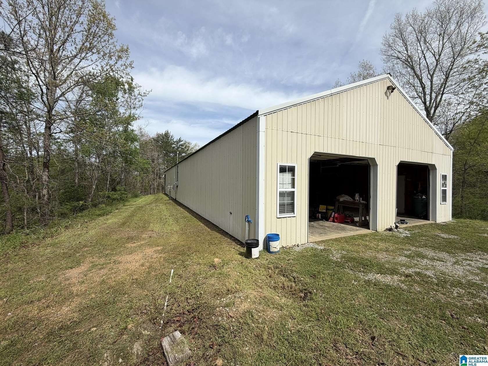 84 Acres of Recreational Land with Home for Sale in Trafford, Alabama