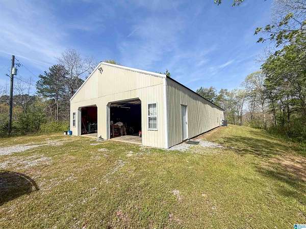 84 Acres of Recreational Land with Home for Sale in Trafford, Alabama