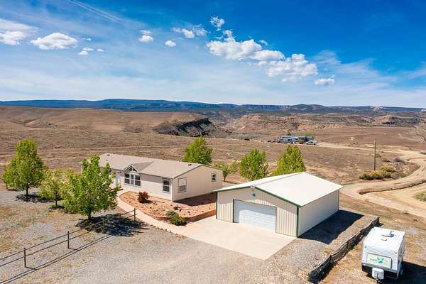 1.79 Acres of Land with Home for Sale in Grand Junction, Colorado