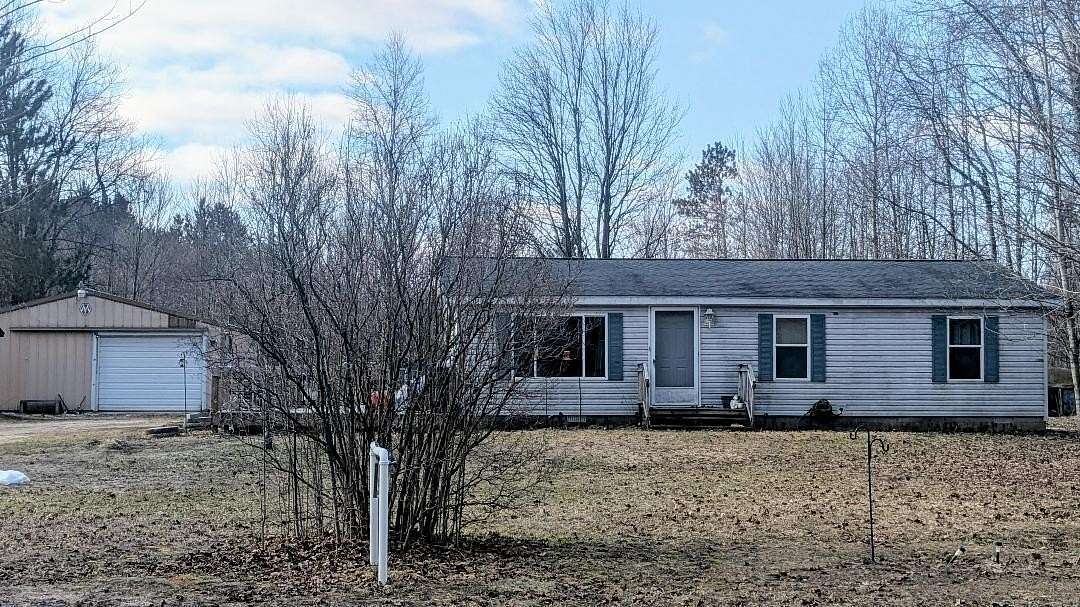 5 Acres of Land with Home for Sale in Thompsonville, Michigan