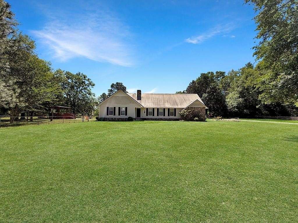6.57 Acres of Land with Home for Sale in Colquitt, Georgia