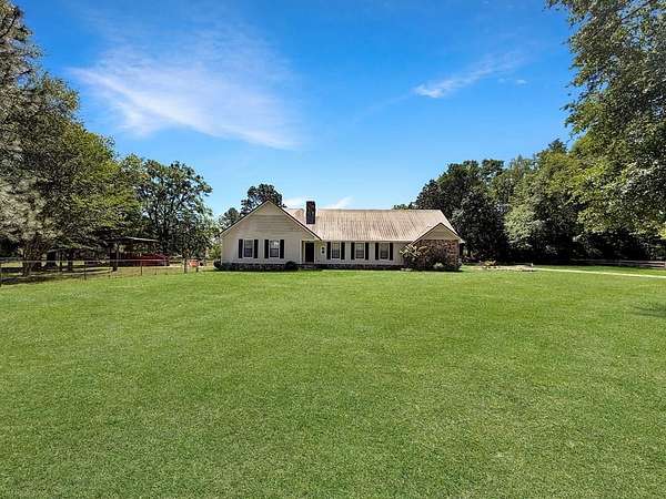 6.57 Acres of Land with Home for Sale in Colquitt, Georgia