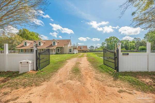 2.35 Acres of Land with Home for Sale in Molino, Florida