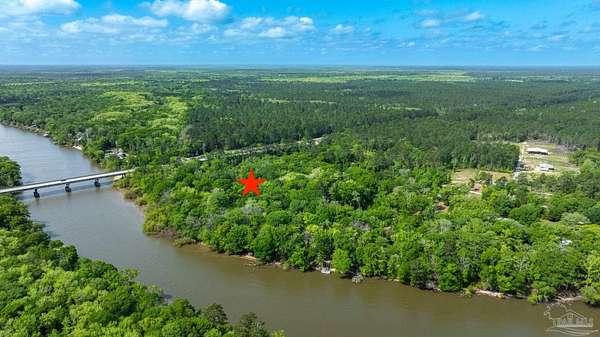 3.82 Acres of Land with Home for Auction in Ponce de Leon, Florida