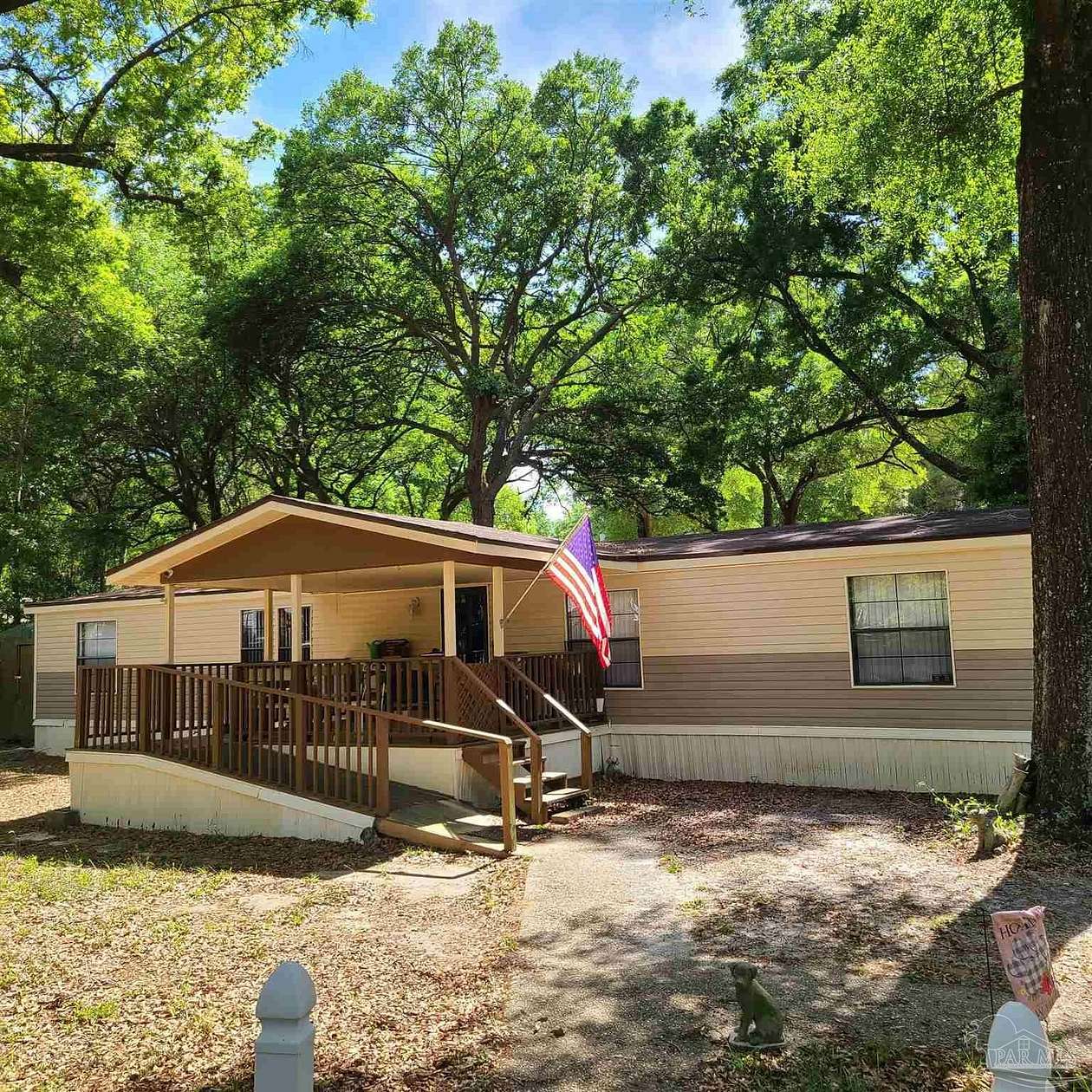 5 Acres of Land with Home for Sale in Pace, Florida