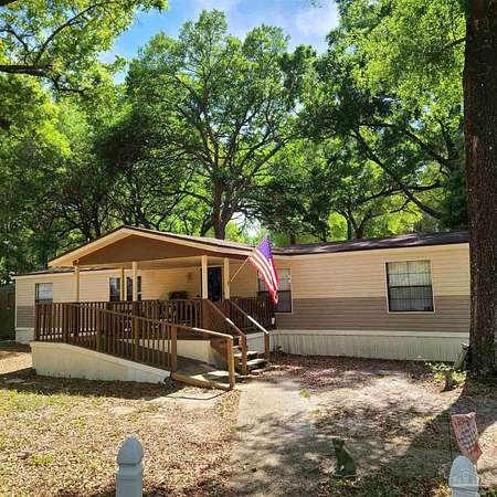 5 Acres of Land with Home for Sale in Pace, Florida