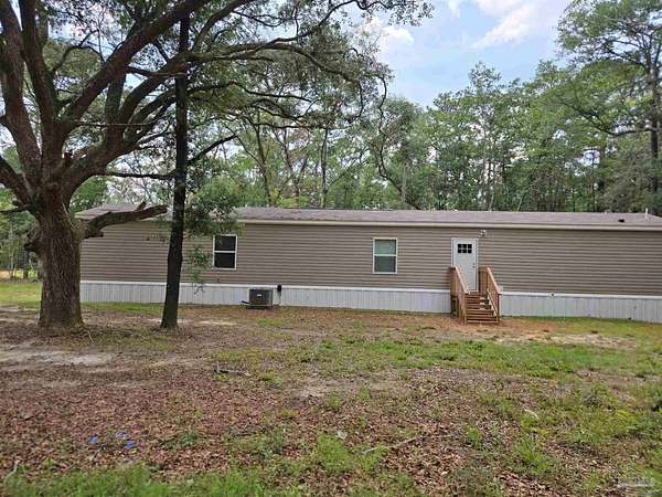 1.84 Acres of Land with Home for Sale in Milton, Florida