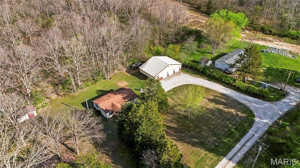 5 Acres of Land with Home for Sale in Winfield, Missouri