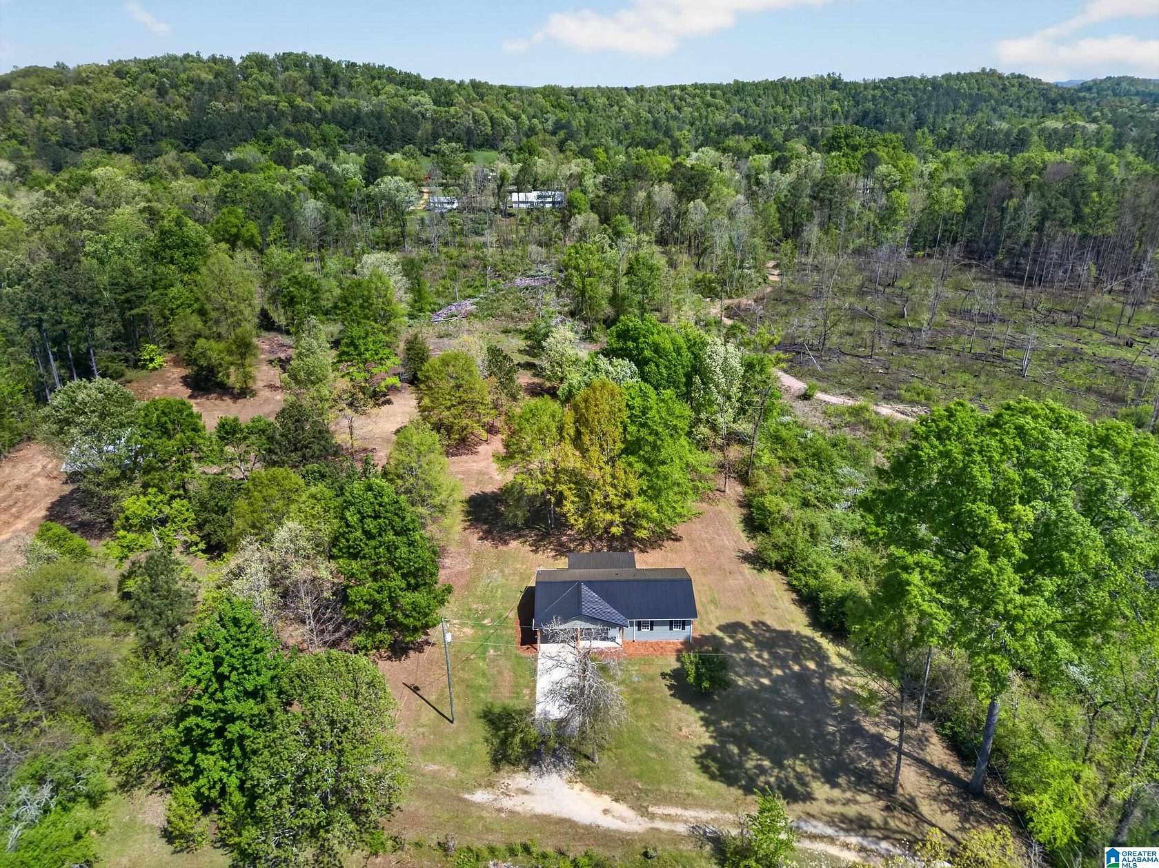 6.88 Acres of Land with Home for Sale in Ohatchee, Alabama