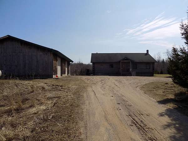 6 Acres of Land with Home for Sale in Gladwin, Michigan