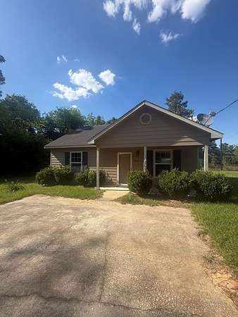 4.59 Acres of Land with Home for Sale in Jasper, Texas