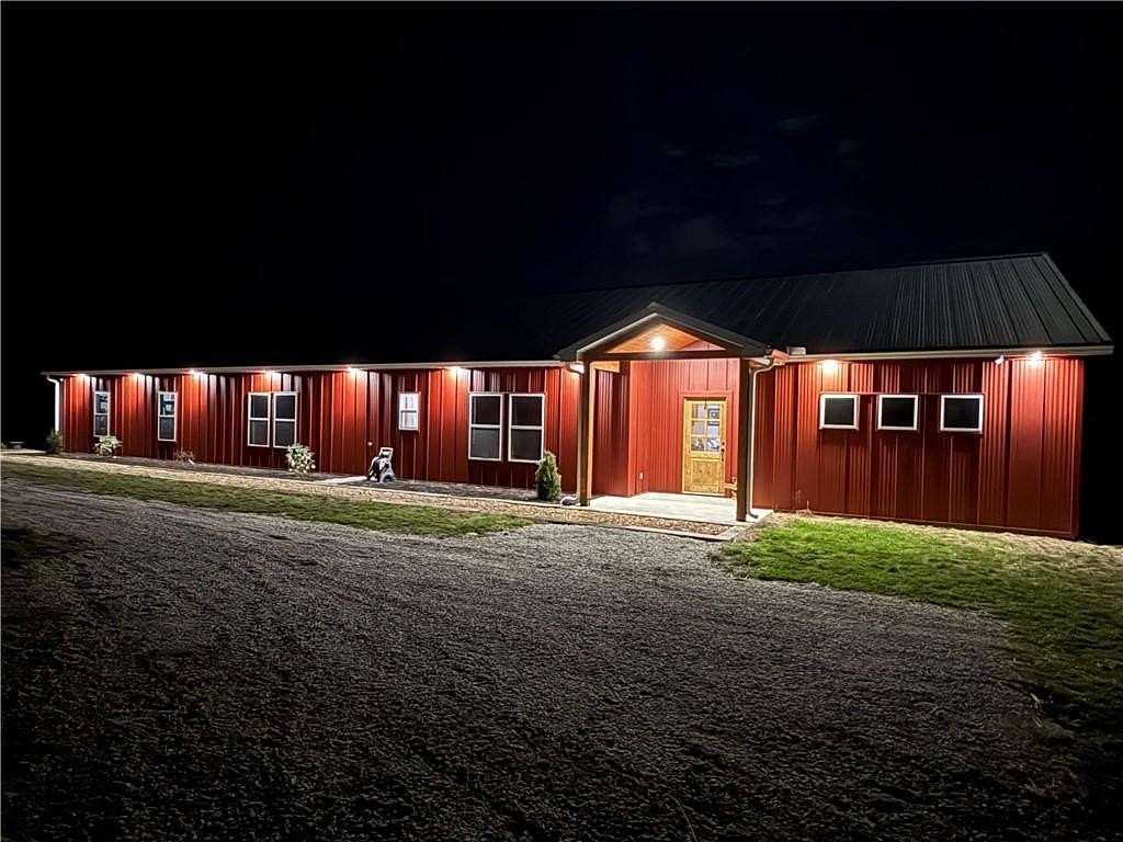 16.7 Acres of Land with Home for Sale in Odessa, Missouri