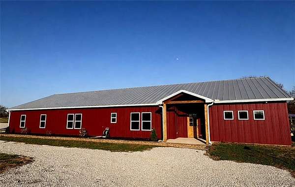 16.7 Acres of Land with Home for Sale in Odessa, Missouri